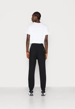 YOURTURN Unisex - Pantalon De Survêtement - Black -Mode-YOURTURN 93239351f3ae4382bd2bf96cade29d39